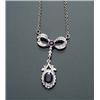 Image 1 : 14-Karat White Gold, Blue Sapphire and Diamond Necklace Set with one oval and one round faceted d...