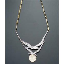 14-Karat Yellow and White Gold and Diamond Necklace The seagulls and orb set with a pavé of round...