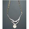 Image 1 : 14-Karat Yellow and White Gold and Diamond Necklace The seagulls and orb set with a pavé of round...