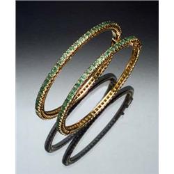 Pair of Indian 22-Karat Yellow Gold and Emerald Bangle Bracelets Each set with seventy-seven roun...