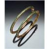 Image 1 : Pair of Indian 22-Karat Yellow Gold and Emerald Bangle Bracelets Each set with seventy-seven roun...