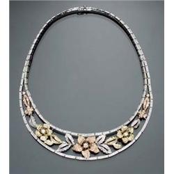 18-Karat Tricolor Gold and Diamond Necklace Set with approximately seven hundred white and fancy...