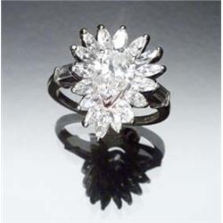 Platinum and Diamond Dinner Ring Set with one pear shape diamond weighing approximately 1.10 cara...