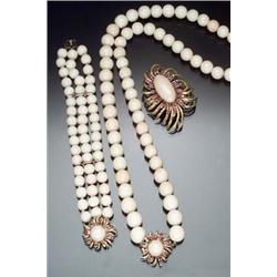 18-Karat Yellow and White Gold and Angel Skin Coral Three-Piece Ensemble Consisting of: an opera...