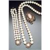 Image 1 : 18-Karat Yellow and White Gold and Angel Skin Coral Three-Piece Ensemble Consisting of: an opera...