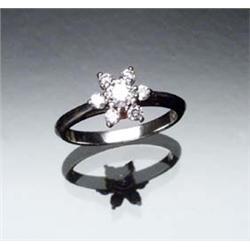 Platinum and Diamond Dinner Ring, Tiffany & Co. Set with seven round brilliant cut diamonds weigh...