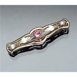 Edwardian 10-Karat Yellow Gold, Enamel, Pearl and Pink Topaz Bar Pin Circa 1900 Set with one roun...