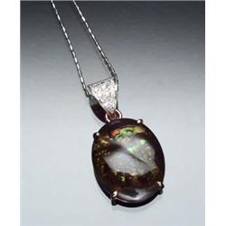 14-Karat Yellow Gold, Diamond and Fire Agate Pendant and Chain The pendant set with a large oval...