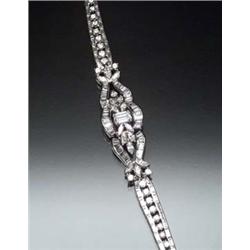 Platinum and Diamond Cocktail Bracelet Circa 1960 Set with one emerald cut diamond weighing appro...