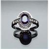 Image 1 : 14-Karat White Gold, Blue Sapphire and Diamond Dinner Ring Set with one oval faceted sapphire wei...