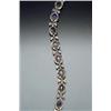 Image 1 : 18-Karat Yellow Gold, Blue Sapphire and Diamond Cocktail Bracelet Set with twelve oval faceted bl...