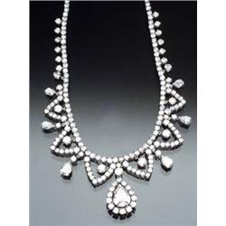 Platinum and Diamond Necklace Set with one large pear shape diamond weighing approximately 3 cara...