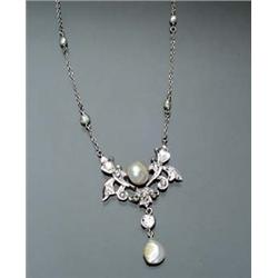Antique Platinum, Baroque Pearl and Diamond Necklace Circa 1900 The bottom portion of the chain h...