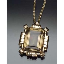 Retro 18-Karat Yellow Gold and Citrine Pendant and Chain Circa 1940 The pendant set with a large...