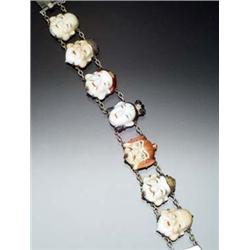 Asian Silver, Porcelain and Enamel Decorated Seven Mask Bracelet Mid 20th Century Length: 7 in (1...