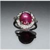 Image 1 : Art Deco Platinum, Star Ruby and Diamond Dinner Ring Circa 1930 Set with one round cabochon star...