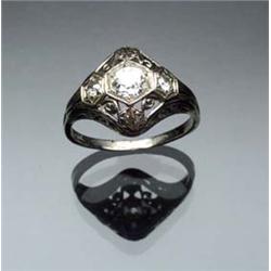 Art Deco 18-Karat White Gold and Triple Diamond Dinner Ring Circa 1920-1930 Set with three old mi...
