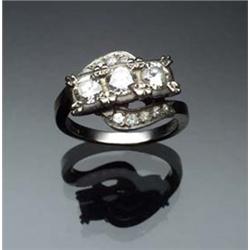 Art Deco 14-Karat White Gold and Triple Diamond Dinner Ring Circa 1935 Set with three round brill...