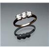 Image 1 : 14-Karat Yellow Gold and Triple Diamond Dinner Ring Set with three old mine cut diamonds weighing...