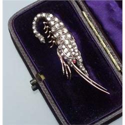 Mid-Victorian Yellow Gold, Silver, Diamond and Ruby Crawfish Pendant Brooch Circa 1860 The body s...