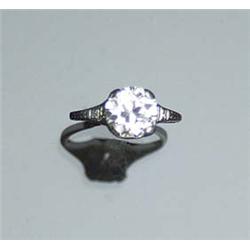 Art Deco Filigree Platinum and Solitaire Diamond Ring Circa 1920 Set with one old mine cut diamon...