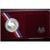 Image 2 : 1984-S US XXIII Olympiad Silver Commemorative $1 Coin In Velvet Display Box; EST. $30-40