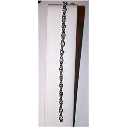 SILVER BRACELET WITH GREEN SAPPHIRE
