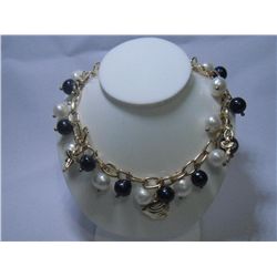 BLACK AND WHITE PEARL CHARM BRACELET; AUTHENTIC PHILIPP