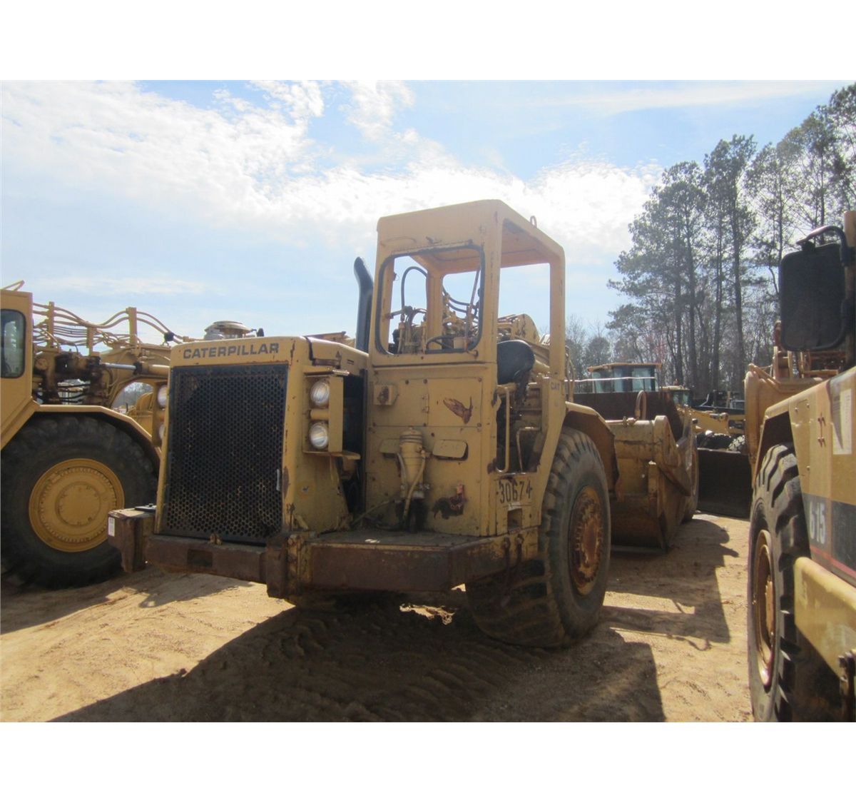 CAT 621B MOTOR SCRAPER - J.M. Wood Auction Company, Inc.