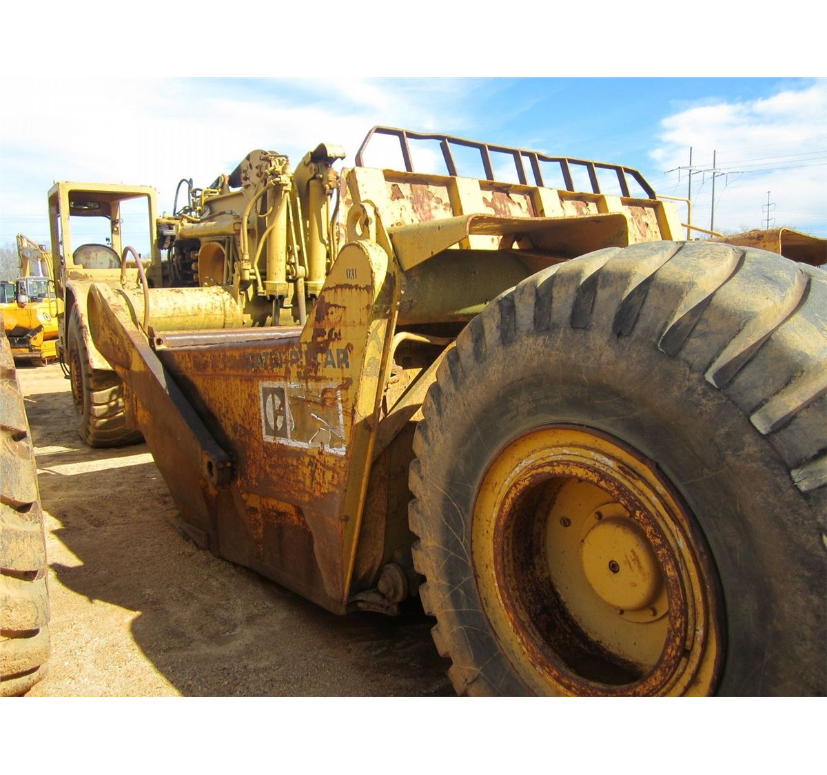 CAT 621B MOTOR SCRAPER - J.M. Wood Auction Company, Inc.