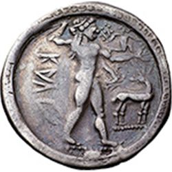 Italy. Bruttium, Kaulonia.   Nomos, circa 500-480 BC. Obv. KAV? retrograde. Naked Apollo advancing r