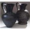 Image 1 : Vases. Two Etruscan bucchero-ware oinochoai. Circa 7th - 6th century BC.  D/ 27 cm and 28 cm high.  