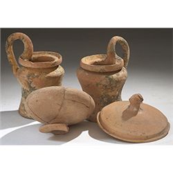 Vases. Four vessels. Circa 5th century BC.  D/ Two Etruscan kyathos.  12 cm high. Both intact. Etrus