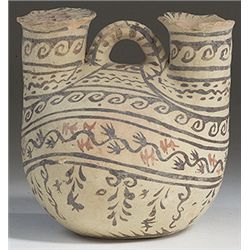 Vases. Daunian terracotta askos. Circa late 4th century BC.  D/ With two vertical spouts, one with s