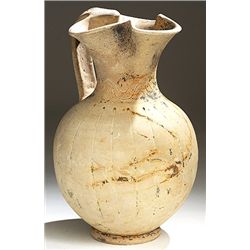 Vases. Italic pottery oinochoe. Circa 4th century BC.  D/ Light pottery, ovoid body, pinched trefoil