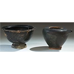 Vases. Two Italic black-glazed vessels. Circa 4th century.  D/ Guttus. North-Adriatic. 7.5 cm high. 