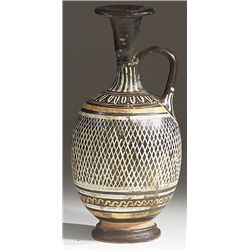 Vases. Apulian black-glaze Gnathian ware squat-lekithos. Circa 4th century BC.  D/ The body decorate