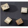 Image 1 : Ivory and bone. Four roman bone dice. Roman imperial.  D/ Three dice with incised dotted rings on ea
