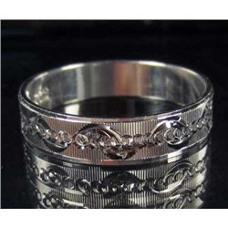 533 - SILVER CARVED EMBROIDERY RING MARKED .925