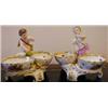 Image 1 : A Pair of Late 19th Century German Sweet Meat Dishes, with a cherub flanked by two oval dishes (a...