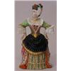 A Rare Mid 19th Century Minton Snuffer, Mrs Malaprop, (The Rivals), in a brightly coloured dress...