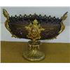A Bronzed Table Centrepiece, the oval bowl with pierced decoration and applied gilt metal masks,...