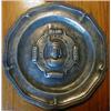 A Pewter Plate, the centre embossed a figure within a cartouche...