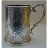 Image 1 : A Victorian Silver Mug, with a presentation inscription, of tapering form, engraved flowers and s...