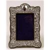 Image 1 : A Silver Mounted Photo Frame, decorated grapes and vines, Chester 1907, 23 x 17 cm  See illustrat...