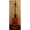 A Cranberry Glass and Brass Table Lamp £100-150...