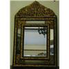 Image 1 : A Late 19th Century Cushion Wall Mirror, the brass mounts embossed and pierced flowers on an ebon...