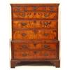 Image 1 : A Walnut Chest on Chest, the moulded top over an arrangement of three short and three graduated l...