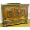 Image 1 : A Late 18th Century Continental Solid Yew Chest, the leaf moulded edge above a large central iron...