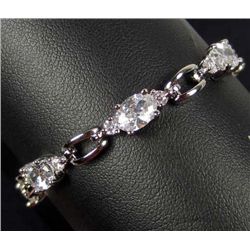 2476 - WHITE GOLD PLATED WHITE TOPAZ BRACELET